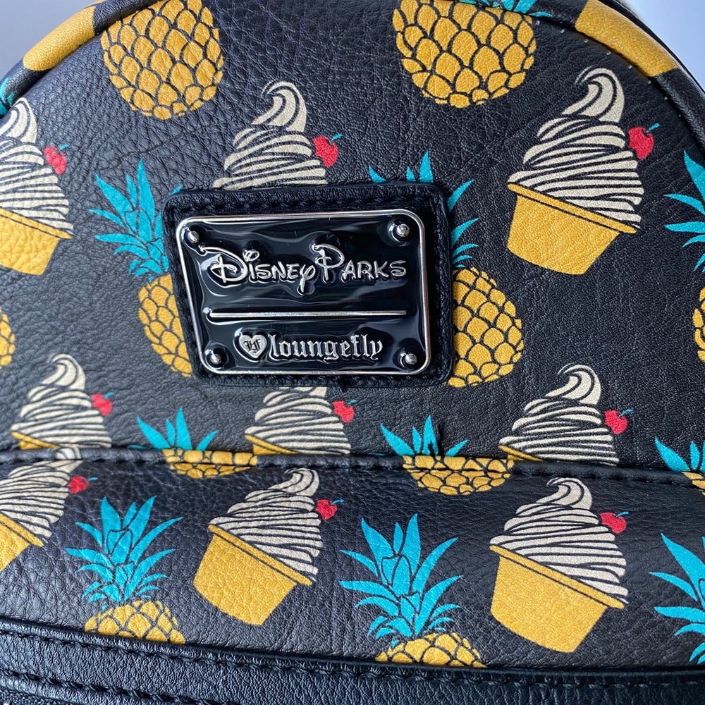 Pineapple swirl dole whip mini backpack. Disney parks heart logo collectible